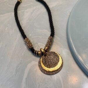 Elegant Gold and Black Pendant Necklace about 30 inches. Can use extender